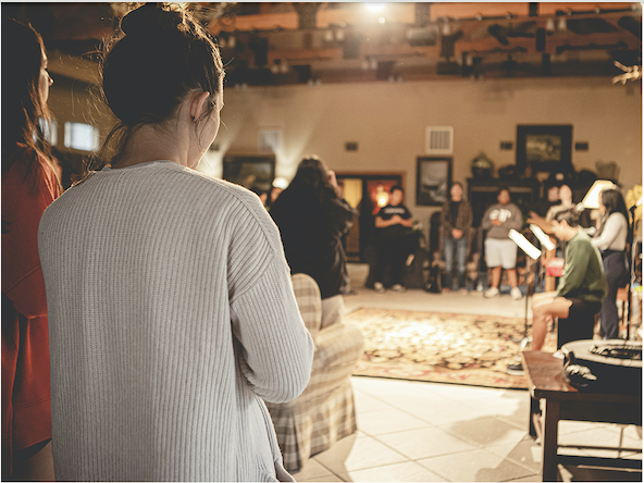 College students gather to pray and worship. October